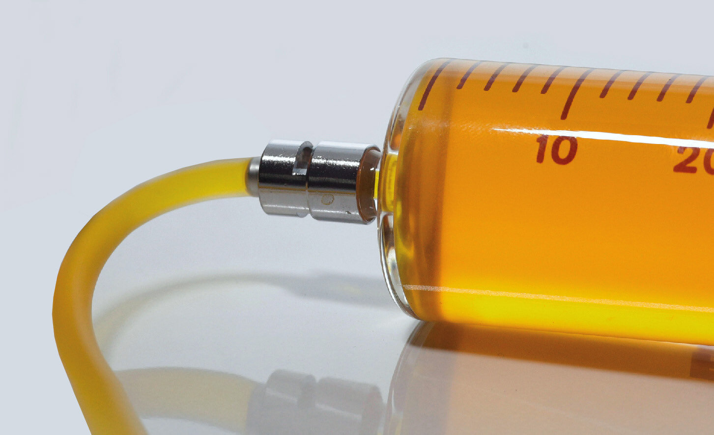 Transformer oil in a syringe